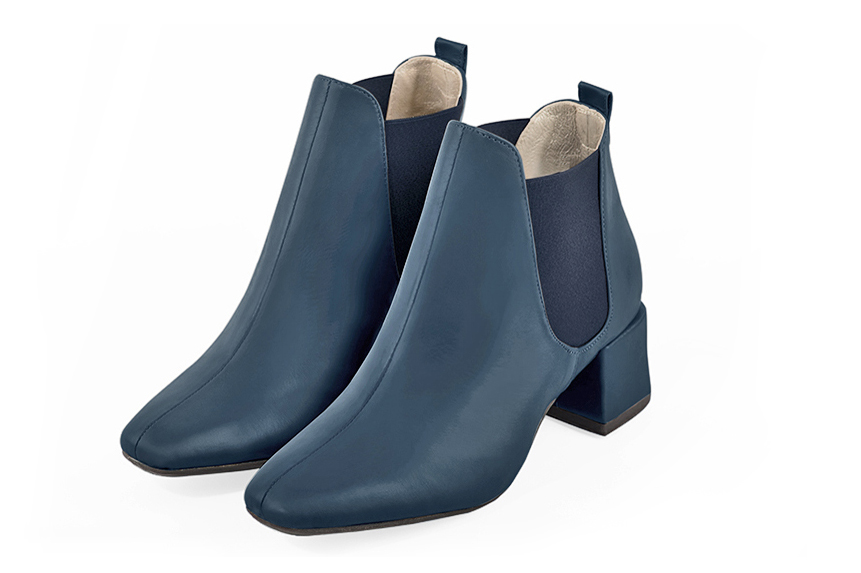 Women's denim blue elegant Chelsea ankle boots, with side elastics. Square toe. Medium block heels - Front view